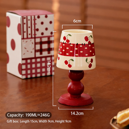 Apple, cherry, and strawberry stemmed mug