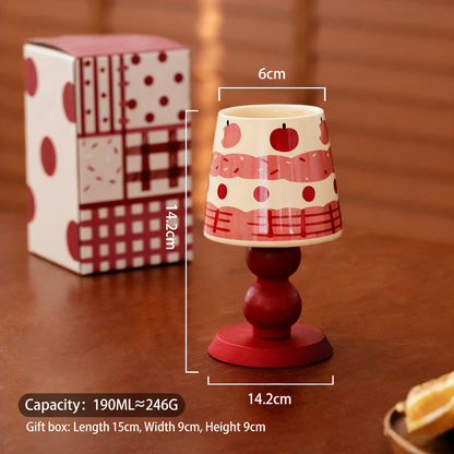 Apple, cherry, and strawberry stemmed mug