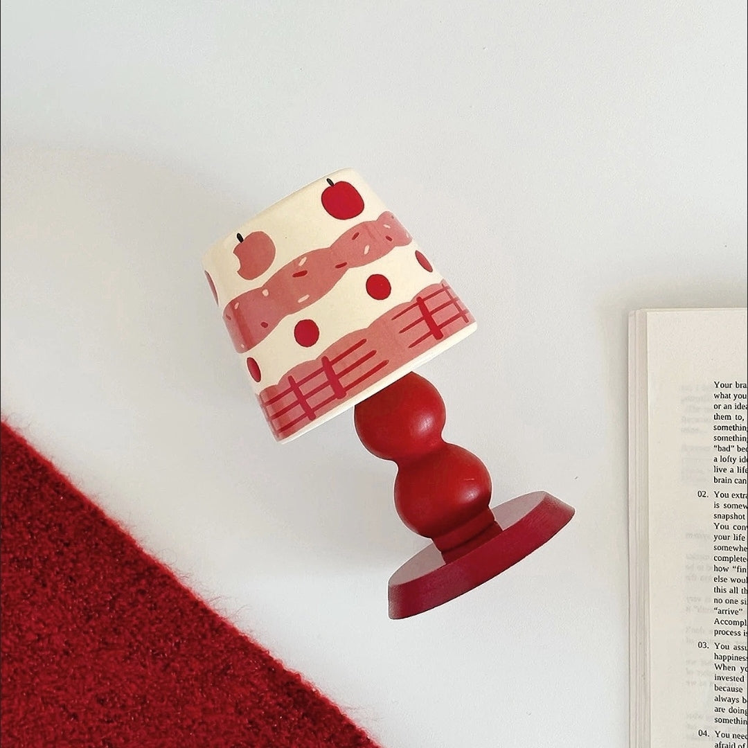 Apple, cherry, and strawberry stemmed mug