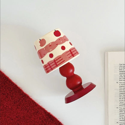 Apple, cherry, and strawberry stemmed mug
