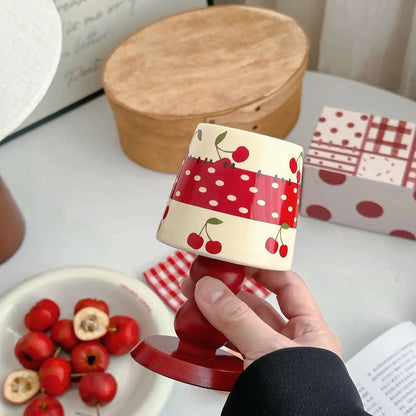 Apple, cherry, and strawberry stemmed mug