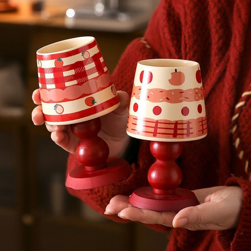 Apple, cherry, and strawberry stemmed mug